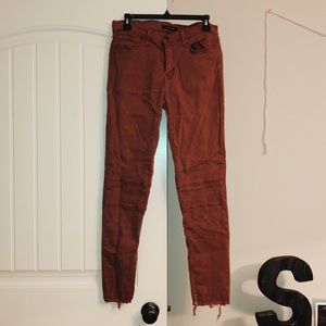 Burnt orange size 29 skinny jeans with knee detail